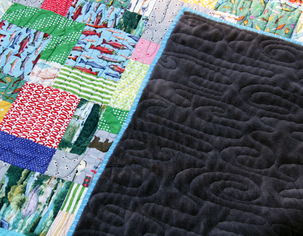 Using a blanket for a quilt back