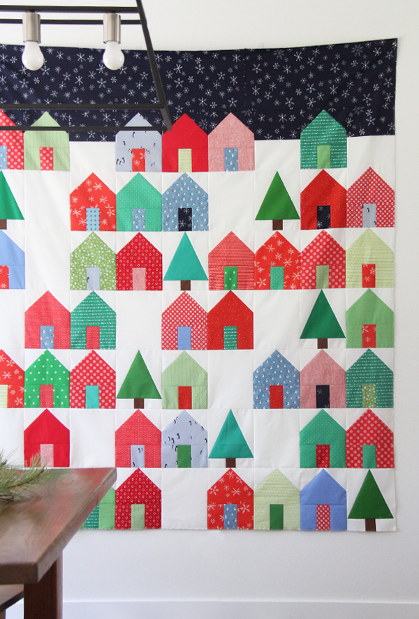 “Suburbs” is a Free Modern Christmas Quilt Pattern designed by Allison from Cluck Cluck Sew
